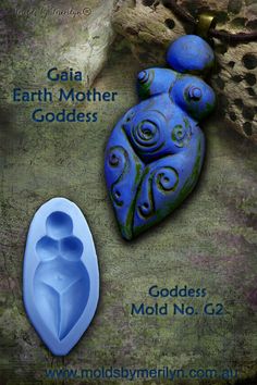 a blue mold next to a rock shaped like a woman's stomach