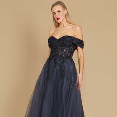 We Now Present The Dylan & David's Long Off-Shoulder Formal Dress, A Classy And Timeless Option For Any Special Occasion. The Off-Shoulder Neckline And Flowing A-Line Silhouette Of This Stunning Dress Scream Refinement. It Is Made From Top-Notch Materials And Has A Lovely And Feminine Appeal As It Flows Elegantly To The Floor. Weddings, Galas, And Proms Are The Ideal Settings For This Outfit's Romantic Lace Accents, Which Lend A Special Touch. This Dress Is The Pinnacle Of Vintage Glitz And Is A Formal Gala Dress, Colorful Dresses Formal, Romantic Lace, Bow Detail Dress, Striped Maxi Dresses, Gala Dresses, 15 Dresses, Polo Dress, Fancy Outfits