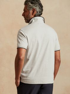 Ideal for warmer adventures, our Luxury Touch Performance Polo is crafted with special anti-odor and moisture-wicking properties to keep it feeling fresh.  Plus this 100% cotton fabric is specially treated to resist fading and discoloration.  Standar Polo Neck, Heather Gray, White Undershirt, Moisture Wicking, Heather Grey, Banana Republic, Polo Shirt, Cotton Fabric, Mens Tshirts