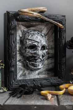 an image of a creepy face in a frame with bananas and other items around it