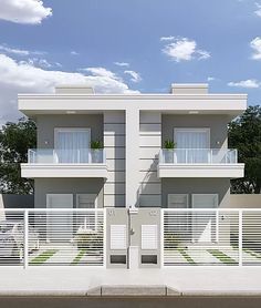 two story apartment building with balconies and white railings