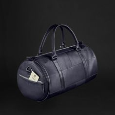 Unveil the epitome of elegance and practicality with our Dark Blue Luxury Weekend Bag. Crafted from premium full-grain leather, this handmade travel masterpiece is your ultimate companion for weekend getaways, gym sessions, or daily endeavors, all while elevating your masculine charm.Here's why this Weekend Bag stands out:High-Quality Full-Grain Leather: Experience durability and a touch of luxury with the finest leather.Detachable Long Strap: Enjoy versatility and comfort in carrying, tailored Designer Travel Bag In Saffiano Leather, Designer Saffiano Leather Travel Bag, Luxury Top Handle Duffle Bag For On-the-go, Luxury Textured Leather Bag For On-the-go, Luxury Blue Bags With Smooth Grain, Luxury Blue Smooth Grain Bag, Luxury Leather-lined Duffle Bag For On-the-go, Luxury Textured Leather Shoulder Bag For Business Trips, Leather Bags For Business Trips With Dust Bag