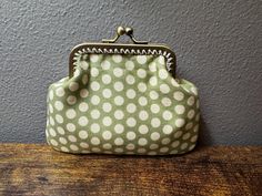 I love these coin purses. They have so many uses! Coins, lipstick, and keys are the usual, but I like to put rings and earrings in them when I travel, or cough drops and gum. So many uses! The purse is made of a light weight cotton and a cotton interfacing to make it sturdy. The purse is stitched solidly into the frame using a coordinating embroidery floss. The coin purse frame is 3 inches, and the bottom of the bag is 4.5. From top to bottom it is 3.5 inches.  This was made in a smoke/pet free home. This item is based on an IndigobirdDesign pattern Cheap Green Coin Purse, Cough Drops, Purse Frame, Coin Purses, Purse Pouch, Embroidery Floss, Halloween Shopping, Selling On Etsy, Gum