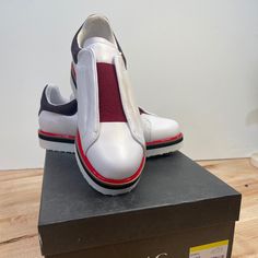 Zac Posen Yenifer Slip-On Sneakers By Zac Zac Posen. Never Worn Lace-Less Sneaker White Color With Red And Blue Trim. An Elastic Strap At The Vamp Delivers Easy-On Style And A Snug Fit To This 100% Leather (Upper) Slip-On Sneaker Set Atop A Cushioned Footbed. Never Been Worn. Chic White Platform Sneakers, Blue Trim, Zac Posen, Leather Slip Ons, Slip On Sneakers, Slip Ons, Sneakers White, Womens Shoes Sneakers, Snug Fit