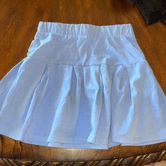 Never Worn Before! Super Stretchy And Good Quality Light Blue Lined Casual Skirt, Light Blue High Waist Denim Skirt, Stretch Blue Tiered Skirt, Casual High Waist Light Blue Skirt, Casual Light Blue High Waist Skirt, Light Blue Lined Skirt Bottoms Casual Style, Blue Stretch Tiered Mini Skirt, Blue Stretch Skirted Skort, Blue Stretch Skort