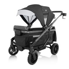 the stroller is black and white with wheels