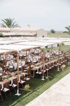 tables and chairs are set up for an outdoor event