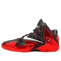 a red and black basketball shoe on a white background