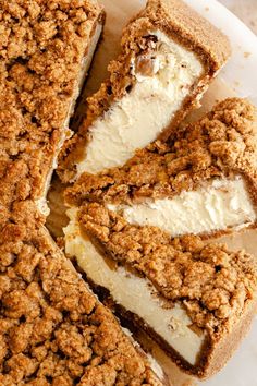 a close up of a cake on a plate with crumbs and ice cream