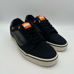 Introducing These Rare Vintage Vans Torer Sneakers, A Perfect Addition To Your Collection. Made With High-Quality Suede Material, These Black And Orange Sneakers Are Sure To Make A Statement. They Are Designed For Athletic Use And Cater To Men With Us Shoe Size 9. The Sneaker Style Is Perfect For Those Who Love The Old School And Skateboarding Vibe. The Vans Torer Sneakers Are A Must-Have! They Are A Unique Addition To Your Wardrobe And Are Made To Be Durable. These Sneakers Are Perfect For Any Orange High-top Skateboarding Sneakers, Orange Mid-top Skate Shoes For Streetwear, Orange High-top Sneakers For Skateboarding, Orange Urban Lace-up Sneakers, Casual Orange Sneakers With Vulcanized Sole, Urban Orange Sneakers For Skateboarding, Casual Orange Mid-top Skate Shoes, Orange High-top Skate Shoes With Vulcanized Sole, Casual Orange Sneakers With Rubber Sole