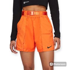 Whether For Gym Or Casual Wear, The Women's Sportswear Swoosh Woven Shorts Will Be The Perfect Fit! Polyester/Nylon Elastic Waistband Two Side Pockets Rise 12.5” Inseam 3” Spring Orange Activewear For Sports, Nike Sporty Nylon Shorts, Nike Sportswear Shorts For Sports, Nike Sporty Training Shorts, Sporty Orange Activewear For Spring, Nike Sporty Athletic Shorts For Sports, Nike Sporty Athletic Shorts For Sports Season, Nike Activewear With Pockets For Sports Season, Nike Athletic Shorts With Pockets For Streetwear