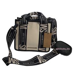 Tik Tok Viral Steve Madden Bwebber Canvas Crossbody Bag , Hard To Find Bag Steve Madden Bwebber Crossbody Purse Steve Madden Tiktok Viral Bag Brand New, With Tags 100% Authentic Color: Black / Tan Approximately : 8" Wide, 7" Tall, 4 Deep Crossbody With Detachable Guitar Strap Flap Snap Closure And Zipper Airpod Case / Coin Purse See My Other Listings For Matching Wallets And Other Steve Madden Bags! Tags: Viral Steve Madden Tik Tok Crossbody Bag Purse , Bevelyn Bag , Bbabi , Bhardyy , Bswpeedy L Tik Tok Viral, Steve Madden Purse, Steve Madden Handbags, Green Purse, Tiktok Viral, Medium Handbags, Steve Madden Bags, Quilted Crossbody Bag, Canvas Crossbody Bag