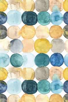 an abstract watercolor painting with circles on it