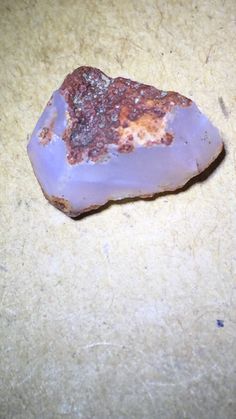 a piece of rock sitting on top of a table