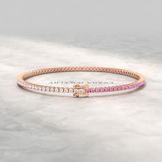 Elevate your style with this stunning 3.24 carat natural pink sapphire ombre tennis bracelet in 14K/18K white gold. Perfect for September birthdays or Christmas gifts, this custom stacking bracelet features a beautiful ombre effect. A timeless and elegant accessory for any occasion. 𝐅𝐞𝐚𝐭𝐮𝐫𝐞𝐬:• 𝐌𝐚𝐝𝐞 𝐭𝐨 𝐎𝐫𝐝𝐞𝐫�• 𝐌𝐞𝐭𝐚𝐥: 𝟏𝟒𝐊 | 𝟏𝟖𝐊• 𝐁𝐚𝐧𝐝 𝐂𝐨𝐥𝐨𝐫𝐬: Rose Gold, Yellow Gold & White Gold• 𝐎𝐩𝐞𝐧 𝐁𝐨𝐱 𝐋𝐨𝐜𝐤 𝐒𝐭𝐨𝐧𝐞:• 𝐒𝐭𝐨𝐧𝐞 - Natural Pink Sapphire• 𝐒𝐡𝐚𝐩 Sapphire Tennis Bracelet, Stacked Wedding Rings, Engagement Rings Oval, Elegant Accessories, White Sapphire, Tennis Bracelet, Open Box, Bracelet Stack, Eternity Bands