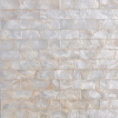 an image of a white brick wall that looks like it is made out of marble