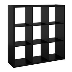 a black bookcase with six cubes on each side