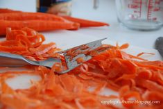 there are carrots that have been chopped up on the table