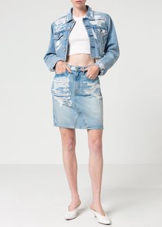 This crop denim jacket features a raw hem finish, patched with heavy destruction and delicate mending stitches, in striking light blue denim.    Model is 5'11" wearing size S.   Approx. Front HPS: 17" Chest: 40"  Approx.  Sweep: 38" Sleeve Length: 23"  Contents: 100% Cotton  Made in USA  Fits true to size. Spring Distressed Denim Jacket In Recycled Denim, Spring Distressed Denim Jacket In Recycled Material, Ripped Cropped Denim Jacket, Mending Stitches, Crop Denim Jacket, Blazer Jackets For Women, Brand Magazine, Jumpsuit Jacket, Blue Denim Jacket