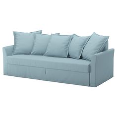 a light blue couch with six pillows on the back and one arm folded over it