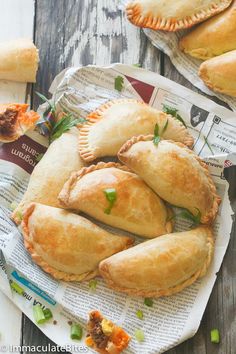 several pastries are stacked on top of each other in the shape of pumpkin pies