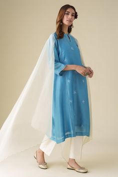 Blue straight kurta with floral embroidery. Paired with a pant and dupatta. Comes along with a slip. - Aza Fashions Blue Embroidered Palazzo Set With Traditional Drape, Blue Palazzo Set With Embroidered Border, Blue Sharara With Chikankari Embroidery For Spring, Spring Blue Sharara With Chikankari Embroidery, Blue Chikankari Embroidered Sharara For Spring, Blue Chikankari Embroidery Sharara For Spring, Festival Blue Palazzo Set With Embroidered Border, White Organza Dupatta, Chanderi Suits