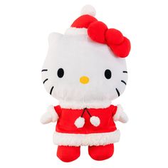 a hello kitty stuffed animal wearing a red dress