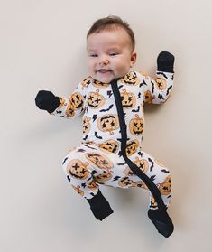 Halloween just got sweeter! Our Halloween bamboo zip romper is the perfect blend of style, softness, and functionality for your little bundle of joy. Your little one will stay cozy and comfortable, whether it's playtime, nap time, or cuddle time. Oh-so-soft and stretchy Fold over mittens & fold over footies The 2-way zipper makes diaper changes a breeze 95% viscose from bamboo; 5% spandex Machine wash cold and tumble dry low Not treated with flame retardants or chemicals Designed with a snug fit