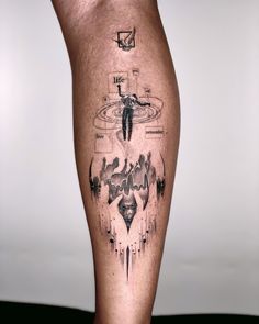 a man's leg with an artistic tattoo design on the lower part of his leg