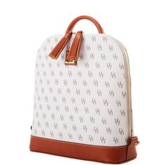 A Mini Monogram Moment  This classic backpack, crafted from lightweight textured Italian coated cotton, will take all your essentials on the go in style. Db Logo, Monogram Pendant, Tan Cowhide, Black Polish, Soft Toothbrush, Credit Card Wallet, Classic Backpack, Red Interiors, Dooney And Bourke