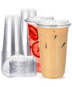 two cups with lids and straws next to each other