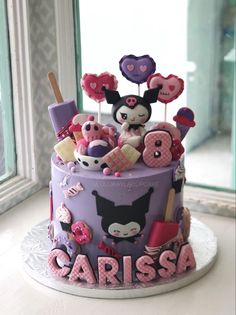 there is a cake decorated with many items