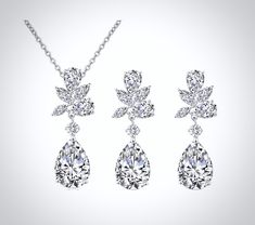 A beautiful bridal jewelry set with an incredible sparkle! Adorned with flawlessly faceted cubic zirconia that capture the light from every angle with a perfectly translucent appeal, the pieces are rhodium / rose gold / yellow gold plated for a bright finish which enhances the intricate detailing and conveys a modern take on old elegance. Necklace: Length - 16" (approx. 40cm) with a 2" (approx. 5cm) extender chain for an overall length of 18" (approx. 46cm); Weight: 6g. Pendant: Length - 1.3" (a Elegant Cubic Zirconia Bridal Set With Diamond Cut, Gift Bridal Sets With Diamond Cut Crystal, Diamond Jewelry Sets For Wedding With Prong Setting, Brilliant Cut Crystal Bridal Sets Gift, Dazzling Wedding Jewelry Sets With Prong Setting, Wedding Jewelry Sets With Prong Setting, Beautiful Bridal Jewelry, Bridal Jewelry Set, All That Glitters