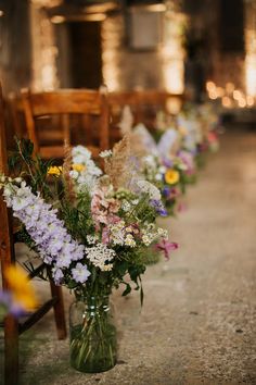 Pretty and colourful flowers in glass vases as aisle wedding decor made up of purple, pink, yellow and white wildflowers Wedding Aisle Decor, Wedding Isles, Wedding Skirt, Spring Wedding Flowers, Rock My Wedding, Aisle Decor