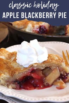 a slice of apple blackberry pie on a white plate