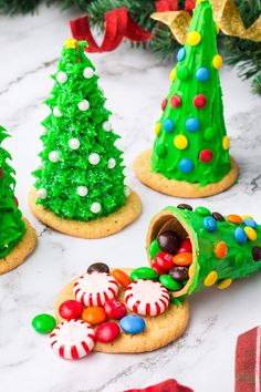 cookies decorated like christmas trees and candy