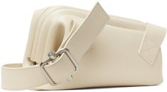 Buffed leather shoulder bag in off-white. · Adjustable crossbody strap · Logo stamp at back face · Hinged closure · Patch pocket at interior · Cotton canvas lining · Logo-engraved silver-tone hardware · H6 x W10.5 x D3.5 Supplier color: Cream White Business Shoulder Bag With Palladium Hardware, White Shoulder Bag With Palladium Hardware For Business, Cream Shoulder Bag For On-the-go, Cream Leather On-the-go Bag, Cream Shoulder Bag With Zipper For On-the-go, Cream Leather Bag With Turn-lock Closure, Off White Slides, Modern Cream Shoulder Bag With Silver-tone Hardware, Cream Bags