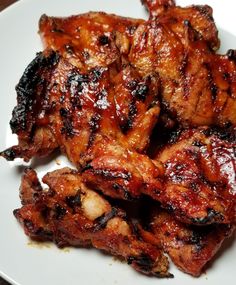 grilled chicken wings on a white plate