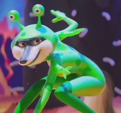 an animated character with green and blue colors