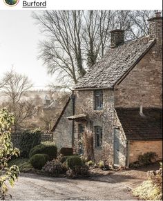 an old stone house in the country side