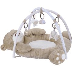 a teddy bear playpen with stuffed animals on it