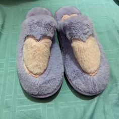 These Purple Slippers Are Brand New And They Have No Use Or Wear On Them. They Are A Size 9/10 For Women . They Are Purple And They Have A Pink Heart In The Front. They Are Memory Foam In The Inside To Keep Your Feet Comfortable. Purple Winter Slippers With Round Toe, Purple Round Toe Winter Slippers, Casual Purple Round Toe Slippers, Tommy Hilfiger Jeans Woman, Mickey Mouse Slippers, Birkenstock Slippers, Purple Slippers, Disney Slippers, Preppy Business Casual