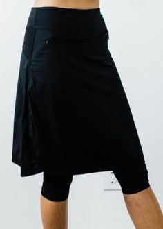 Versatile Fitted Mid-thigh Length Bottoms, Versatile Full Length Lined Skirt Bottoms, Solid 4-way Stretch Skirt, Versatile Full-length Stretch Skirt, Fitted Yoga Bottoms With Elastic Side Panels, Fitted Full Length Bottoms With Elastic Side Panels, Black Stretch Wrap Skirt, Stretch Knee-length Skort, Knee-length Stretch Skort In Solid Color