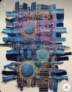 a piece of art made out of old jeans