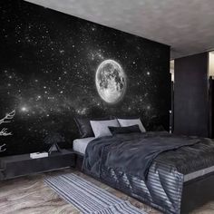 a bedroom with a large bed and stars in the night sky wall mural on it