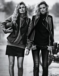 two beautiful young women walking down the street