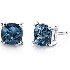 Our midnight muse You'll immediately fall in love with this mystical, midnight London Blue Topaz. These classic earrings feature cushion cut Peora natural london blue topaz gemstones in 14K white gold. Our natural London Blue Topaz gemstones are a unique gift from nature. By cutting them in a way that respects the rough's natural radiance, we ignite their inherent intensity and maximize their brilliance to deliver on our signature Peora standard. Handcrafted in pure 14K white gold goodness, these earrings have been carefully coated in an elegant rhodium finish. Our artisans are expertly trained in this process which fortifies the earring's strength, shine and brilliance. Shopping for birthdays, bridal parties or other occasions? Our concierge stylists are here to help with all of your jewe London Blue Topaz Earrings, Jewelry Questions, White Gold Studs, White Gold Earrings Studs, Gold Cushions, Blue Topaz Earrings, Solitaire Studs, Classic Earrings, Gemstone Stud Earrings