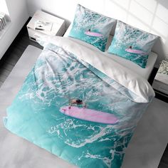 a bed with a pink surfboard in the ocean