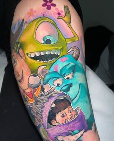 an arm with cartoon characters painted on it