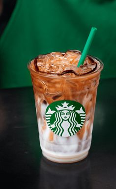 a starbucks iced coffee drink on a table